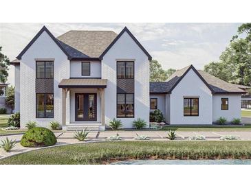 Two-story white brick home with black accents, and a landscaped front yard at 1276 A Rutledge Rd, Acworth, GA 30101