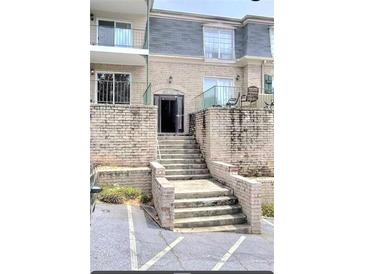 Brick building exterior with stairs leading to the entrance at 2805 Northeast Ne Expy # B36, Atlanta, GA 30345