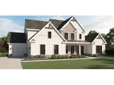 Inviting two-story home featuring white siding, complemented by stone accents and a well-manicured lawn at 5893 Fords Rd, Acworth, GA 30101