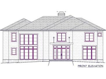 Front elevation of a house with large windows, modern exterior, and stone accents at 174 Devore Rd, Alpharetta, GA 30009