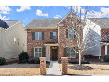 Brick two-story home with a walkway and landscaping at 3540 S Sherwood Road Se, Smyrna, GA 30082