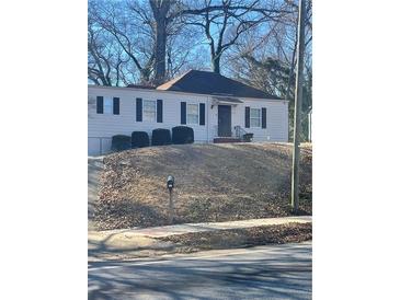 Charming ranch home with mature trees and landscaping at 534 Hamilton E Holmes Dr, Atlanta, GA 30318