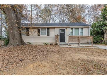 Ranch style home with updated exterior and landscaping at 905 Fairburn Nw Rd, Atlanta, GA 30331