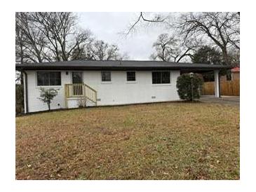 Newly renovated ranch home with fresh paint and landscaping at 2662 Sweetwater St, Austell, GA 30106