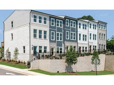 Beautiful new townhome exteriors showcase stylish architecture and professional landscaping at 353 Skylar Se Way, Atlanta, GA 30315