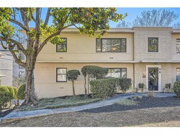 Attractive light brick building with landscaping and walkway at 98 Ardmore Nw Pl # 3, Atlanta, GA 30309