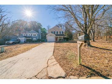House exterior view with driveway and yard at 1129 Winston Dr, Decatur, GA 30032