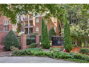 Beautifully landscaped entrance to The Manor House condominium complex on Fifty Biscayne at 50 Biscayne Dr # 2109, Atlanta, GA 30309