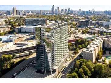 Aerial view of a modern high-rise building in a city setting at 788 W Marietta Nw St # 212, Atlanta, GA 30318