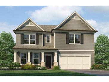 Two-story house with gray siding, white trim, and a two-car garage at 3103 Steinbeck Way, East Point, GA 30344