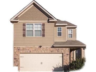 Charming two-story home with a stone and siding exterior and a two-car garage at 529 Dasheill Ln, Atlanta, GA 30349
