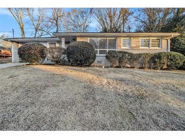Ranch style home with mature landscaping and a spacious yard at 2372 Tyler Way, Decatur, GA 30032