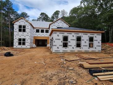 Two-story house under construction, features a large yard at 1273 Grayson Pkwy, Grayson, GA 30017