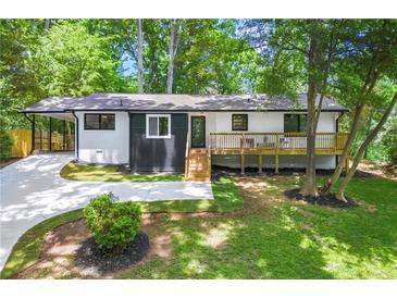 Charming ranch home with modern updates and deck at 1507 Lively Ridge Ne Rd, Atlanta, GA 30329
