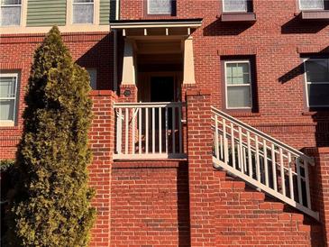 Brick front exterior with stairs leading to the entrance at 2119 Gorman Se Grv # 126, Atlanta, GA 30316