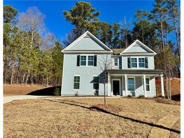 Two-story house with gray siding, shutters, and a front porch at 2791 Riverchess Lot 147 Ct, Atlanta, GA 30331