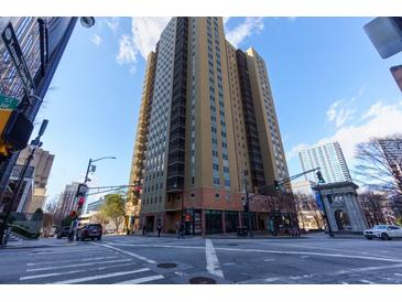 Peachtree Towers building exterior, featuring modern architecture and city views at 300 W Peachtree Ne St # 8E, Atlanta, GA 30308