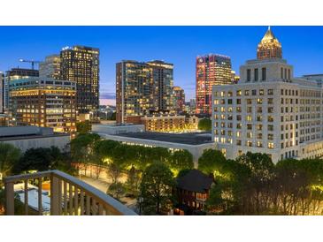 Stunning cityscape view at night from a private balcony at 943 Peachtree Ne St # 1109, Atlanta, GA 30309