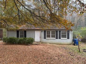 Ranch style home with gray siding and black shutters at 2909 Diana Sw Dr, Atlanta, GA 30315