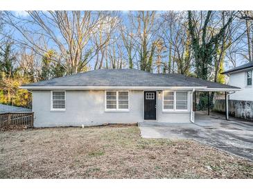 Charming ranch home with gray brick exterior and carport at 2224 Polar Rock Sw Ave, Atlanta, GA 30315