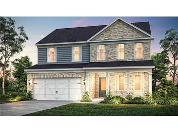 Two-story brick and siding home with a white door and attached two-car garage at 1646 Tide Mill Rd, Cumming, GA 30040