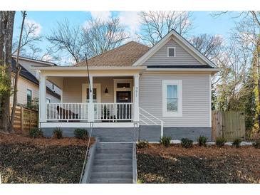 Charming craftsman home with a front porch and landscaped yard at 771 Tift Sw Ave, Atlanta, GA 30310