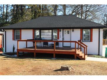 Charming ranch home features a newly renovated exterior with a deck at 2185 Fairfield St, Smyrna, GA 30080