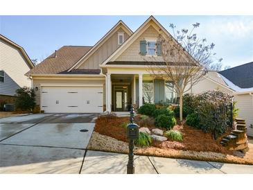 Craftsman style home with front porch and landscaped yard at 314 Pepperwood Way, Canton, GA 30114