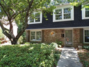 Brick front of charming two-story home with lush landscaping at 2482 Northlake Ct, Atlanta, GA 30345