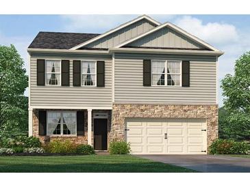 Two-story house with stone accents and a two-car garage at 37 Willow Green Trce, Dallas, GA 30157