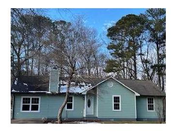 Charming light blue house with a spacious yard at 175 Brown Rd, Stockbridge, GA 30281