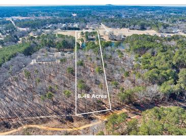 8.48 acre lot with pond, located near Hwy 78 at 3228 Rosebud Rd, Loganville, GA 30052