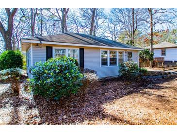 Charming ranch home with mature landscaping and a spacious yard at 1991 Judy Se Cir, Marietta, GA 30060