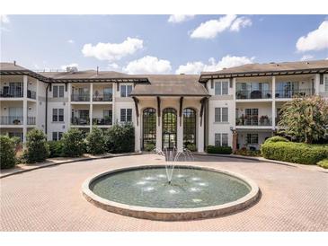 Elegant building exterior with fountain and landscaping at 3101 Howell Mill Nw Rd # 206, Atlanta, GA 30327