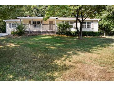 Ranch home with large yard and deck at 4770 Shady Rest Dr, Powder Springs, GA 30127