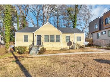 Cute ranch home with a yard, satellite dish and mature trees at 1368 Wichita Sw Dr, Atlanta, GA 30311