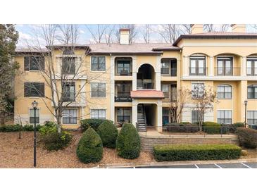 Attractive three-story building with terracotta accents and landscaping at 3777 Peachtree Ne Rd # 713, Atlanta, GA 30319