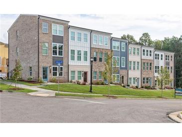 Modern townhouses with brick and siding exteriors at 2654 Brookview Nw Ln, Atlanta, GA 30318