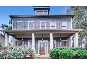 Charming two-story home with a welcoming front porch and well-maintained landscaping at 1520 Vassar Ave, College Park, GA 30337