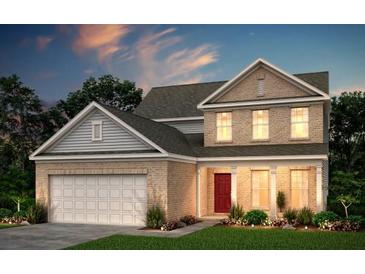 Two-story brick home with a white garage door and landscaping at 329 Foxglove Way, Mcdonough, GA 30253