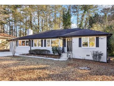 Charming ranch home with updated exterior and landscaping at 814 Bank Se St, Smyrna, GA 30080