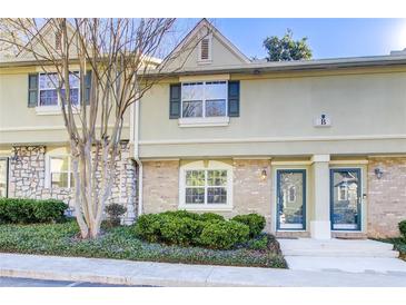 Attractive exterior of townhome with landscaping at 6900 Roswell Rd # 3B, Atlanta, GA 30328