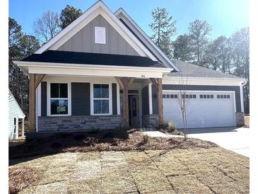 Charming single-Gathering home with two-car garage and manicured front lawn in a tranquil neighborhood at 44 Easton Park Blvd, Dallas, GA 30157