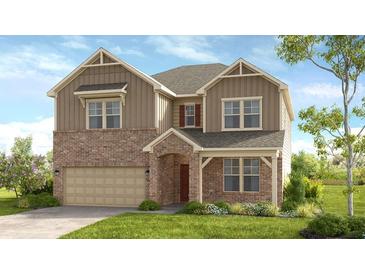Two-story brick house with a large front yard and attached garage at 1346 Auburn Glen Rd, Dacula, GA 30019