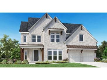 Two-story house featuring white brick, brown roof, and a two-car garage at 6745 Dahlgren Ct, Cumming, GA 30028