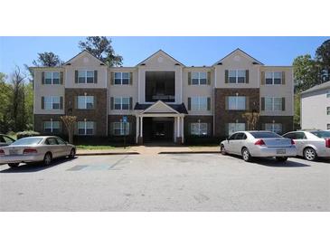 Attractive apartment building with ample parking at 6101 Waldrop Pl, Decatur, GA 30034