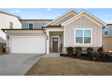 Two-story house with gray siding, white trim, and a brown front door at 79 Dew Drop Ln, Dallas, GA 30157