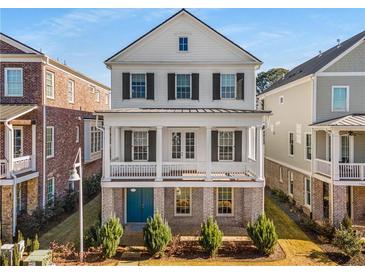 Two-story home with white siding, black shutters, and a front porch at 7535 Cordery Rd, Cumming, GA 30040