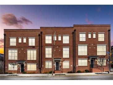 Brick townhouses with modern design, showcasing a clean and contemporary aesthetic at 75 Boulevard Ne # 1, Atlanta, GA 30312