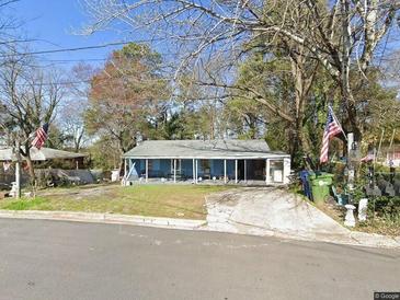 Ranch style home with front porch and large yard at 2193 Abner Pl, Atlanta, GA 30318